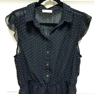 Black polka-dot blouse